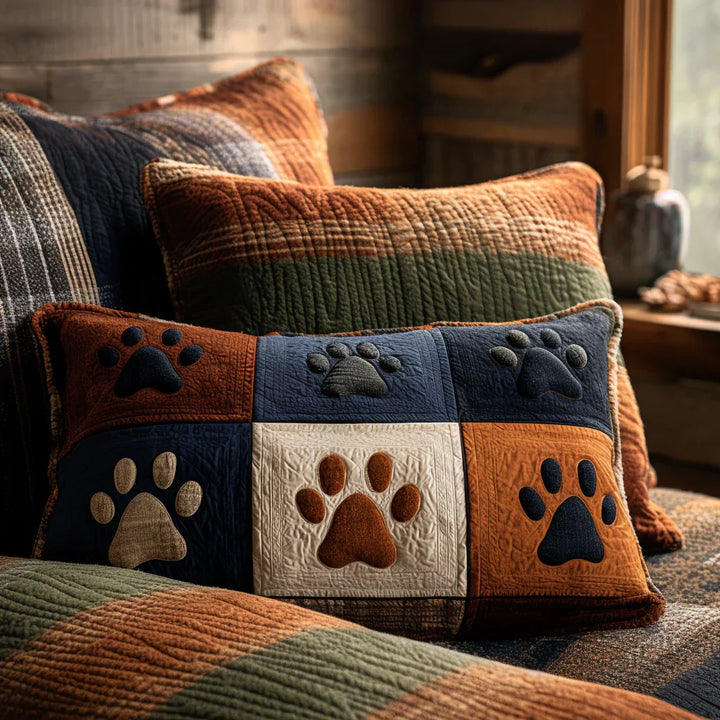 Quilted cushion cover with grass and footprints
